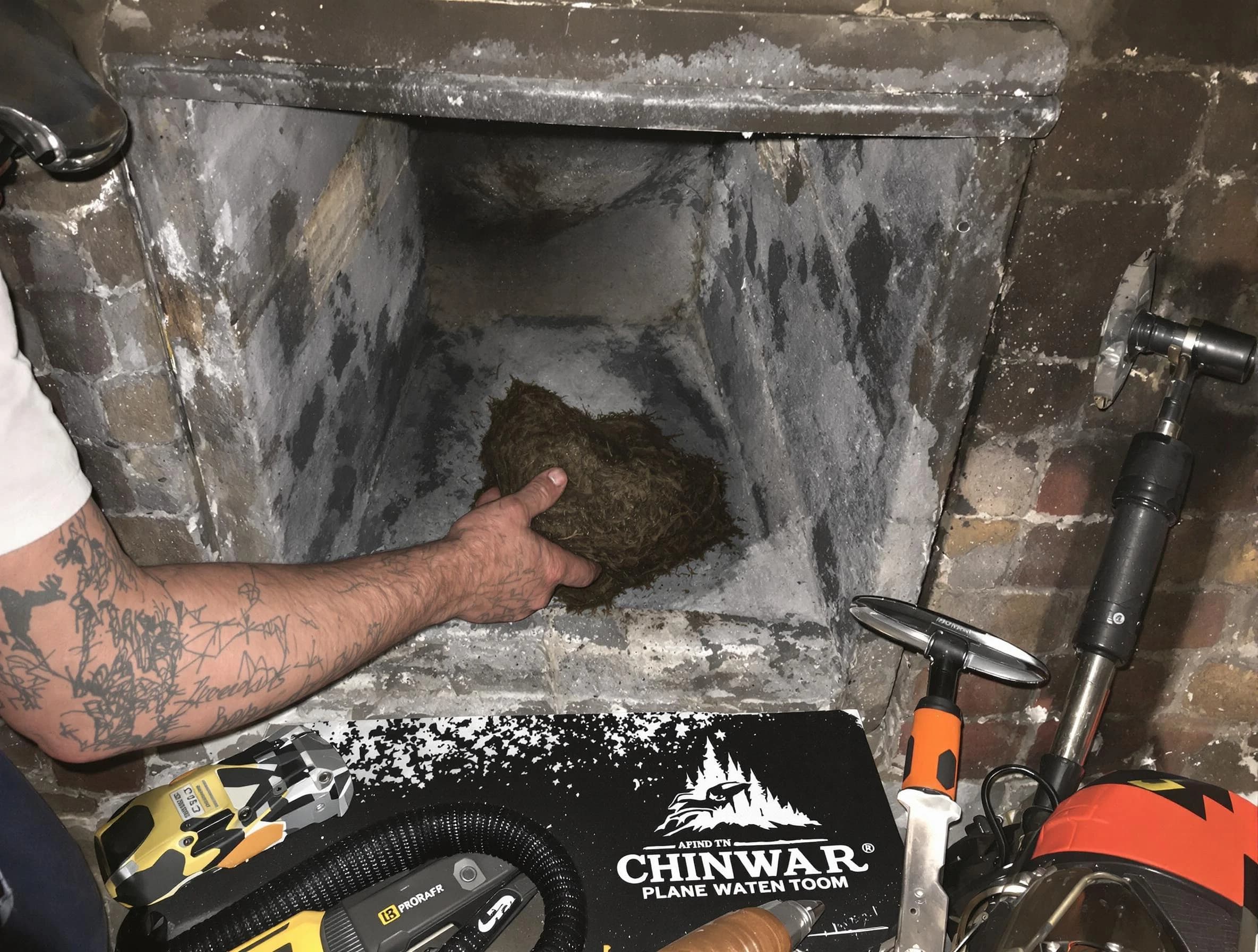 Draper Chimney Sweep safely removing debris and screening chimney in Draper, UT