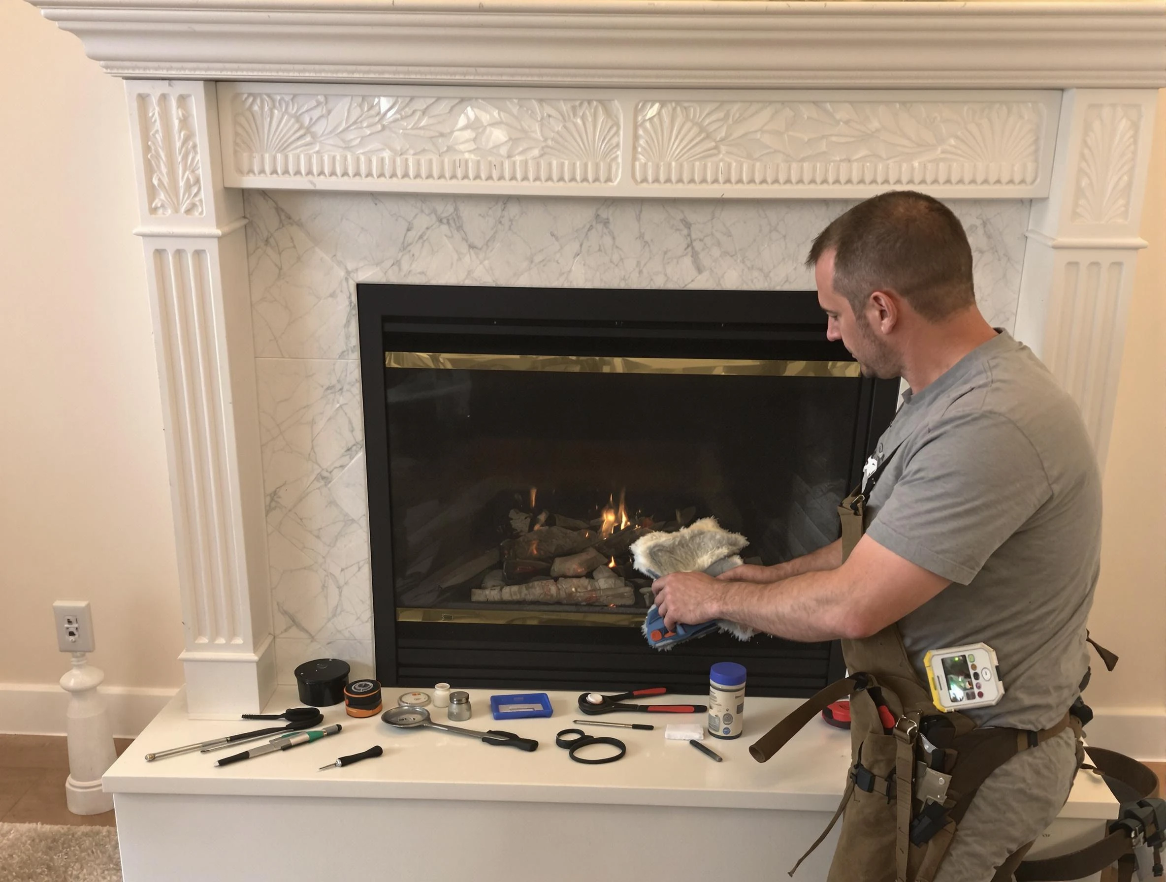 Draper Chimney Sweep performing fireplace maintenance in Draper, UT